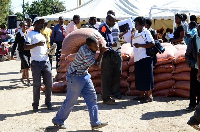 Makokoba residents receive food aid in this file photo