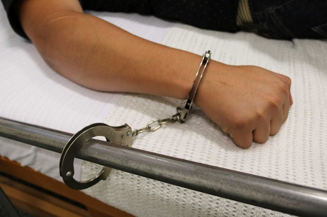 handcuff hospital