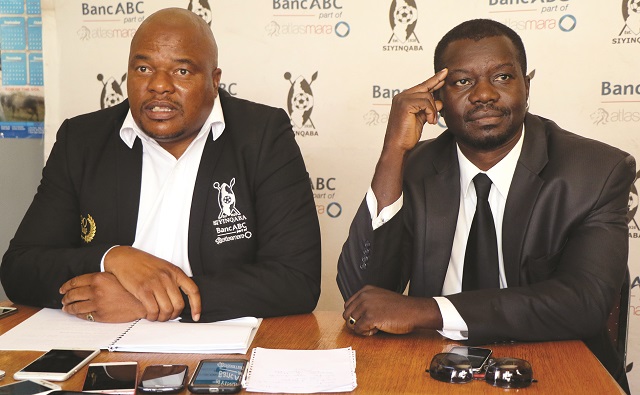 Highlanders Football Club vice chair Modern Ngwenya with CEO Nhlanhla Dube