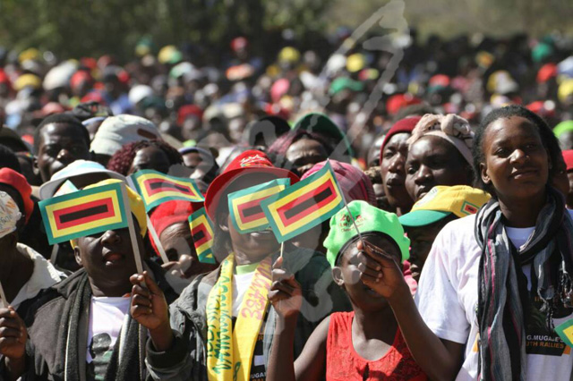 Part of the thousands ready to listen to President Mugabe's address at Somhlolo in Lupane this afternoon.