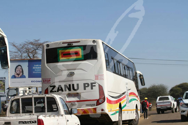 A coach branded with Zanu-PF colours.