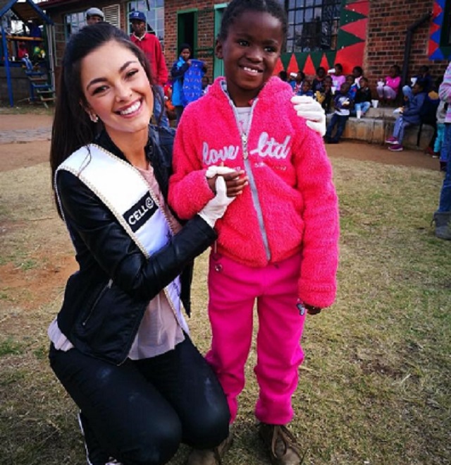 Miss SA with one of the children