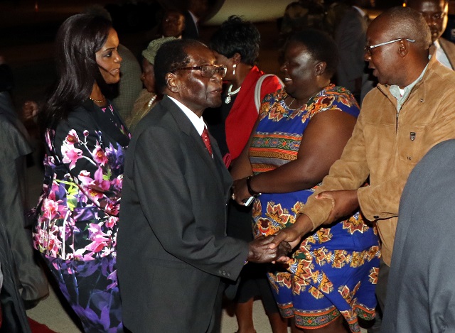 President Mugabe and First Lady Dr Grace Mugabe arrived in Bulawayo last night enroute to Lupane today for the Matabeleland North Presidential Youth Interface rally. In the picture they greet party members at the Joshua Mqabuko Nkomo International Airport