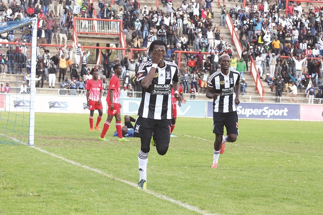 Ralph Matema celebrates after scoring