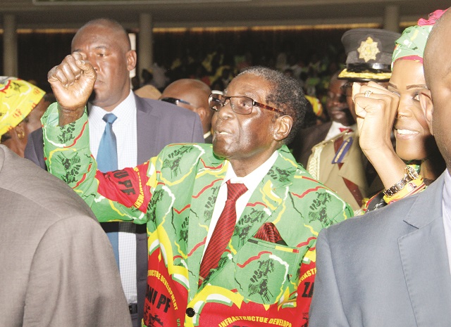 President Mugabe arrives at the Zanu-PF Women's League National Assembly meeting in Harare yesterday