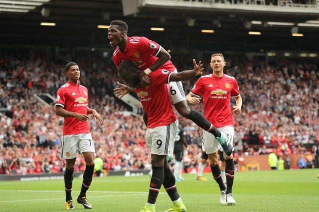 Manchester United players celebrate
