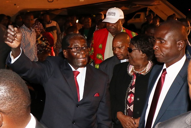 President Mugabe arrives at the Joshua Mqabuko Nkomo International Airport in Bulawayo last night ahead of the Matabeleland South Presidential Youth Interface rally. He is received by Vice President Phelekezela Mphoko and Zanu-PF party officials