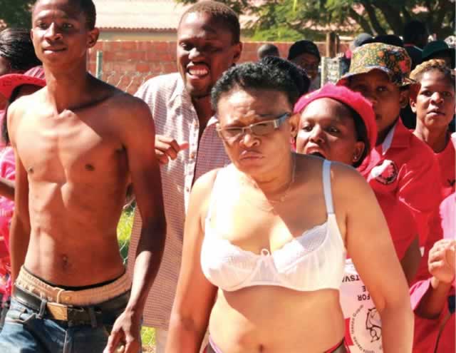 A topless Tabitha Khumalo leads a chaotic MDC-T protest in this file photo