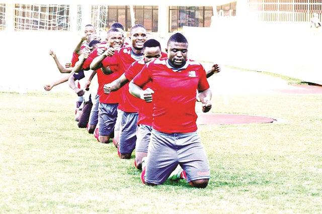 ZDF Select striker Allan Tavarwisa leads his teammates in celebrating his goal during their match against Highlanders at the National Sports Stadium yesterday. (Picture by John Manzongo)