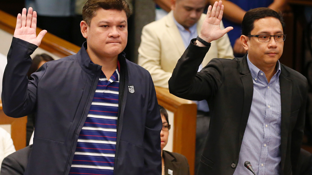 Paolo Duterte, left, and Carpio at yesterday's Senate hearing on drug smuggling. —Reuters