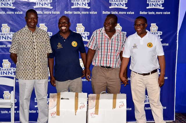 Zimbabwe National Army Commander, Lieutenant General Philip Valerio Sibanda shares a lighter moment with first runner up Jebus Karuru (second from left) and former Highlanders chairman Themba Ndlela as well as Baker's Inn chief executive officer Ngoni Mazango (right) during the ZNA, Baker's Inn Charities Golf tournament awards ceremony at Harry Allen Golf club on Saturday night.