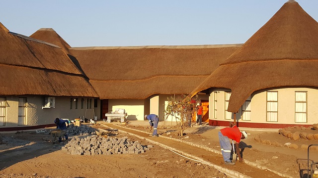 Workers put final touches at Zhove Leisure Park ahead of the hotel's opening next week
