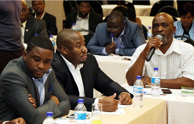 Bulawayo Chamber of SMEs chairperson Mr Energy Majazi stresses a point during the Business Chronicle Pre-Budget dialogue yesterday. Following proceedings among the guests are the Sunday News Editor Limukani Ncube (left) and Chronicle Editor Innocent Madonko (second left)