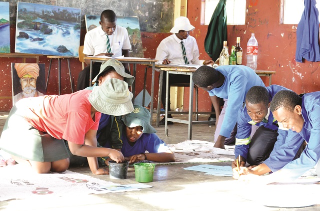 Art students busy expressing themselves in class