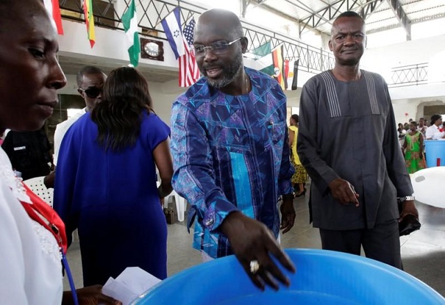 George Weah, former soccer player and presidential candidate of Congress for Democratic Change (CDC), is pictured at a church in Monrovia, Liberia, on October 8, 2017. — Reuters