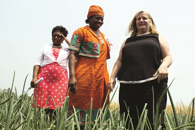 The United States Embassy Deputy Chief of Mission, Ms Jennifer Savage, (right) Lupane Women's Development Trust director Mrs Hildegard Mufukare (centre) and an unidentified embassy official after the handover of the grant in Lupane recently