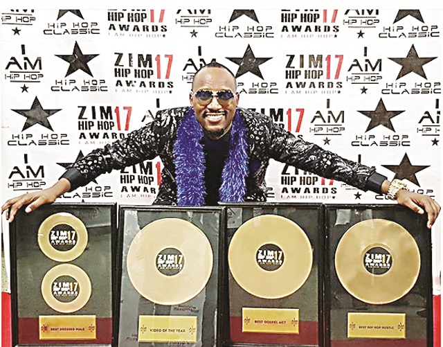 Mudiwa with his awards