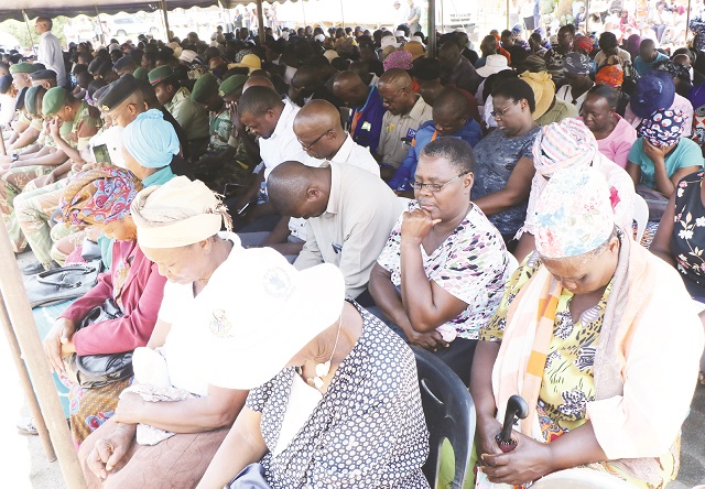 Families of the Tsholostho accident victims join in prayer at a service held at Mpilo Central Hospital in Bulawayo yesterday