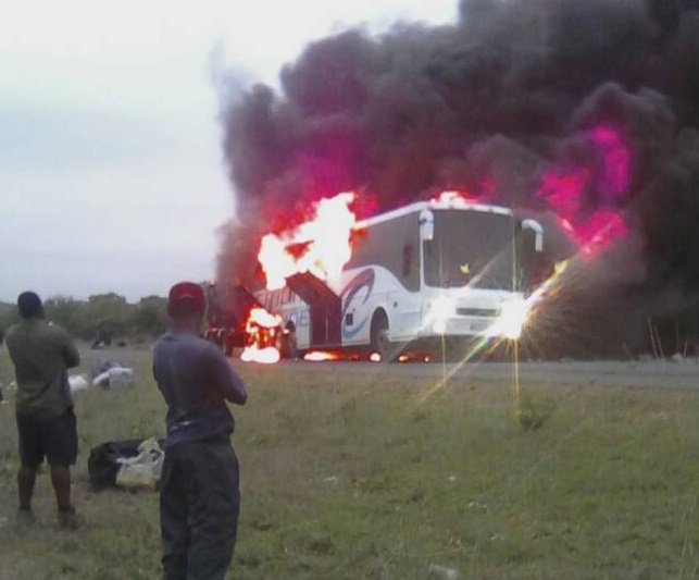 The Citiliner bus burns near the 40 km peg along the Beitbridge-Masvingo Road yesterday morning.